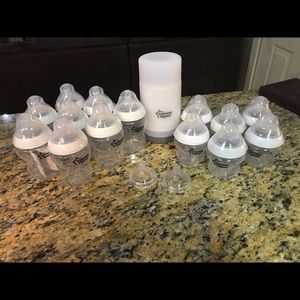 Tommee tippee bottles and travel bottle warmer